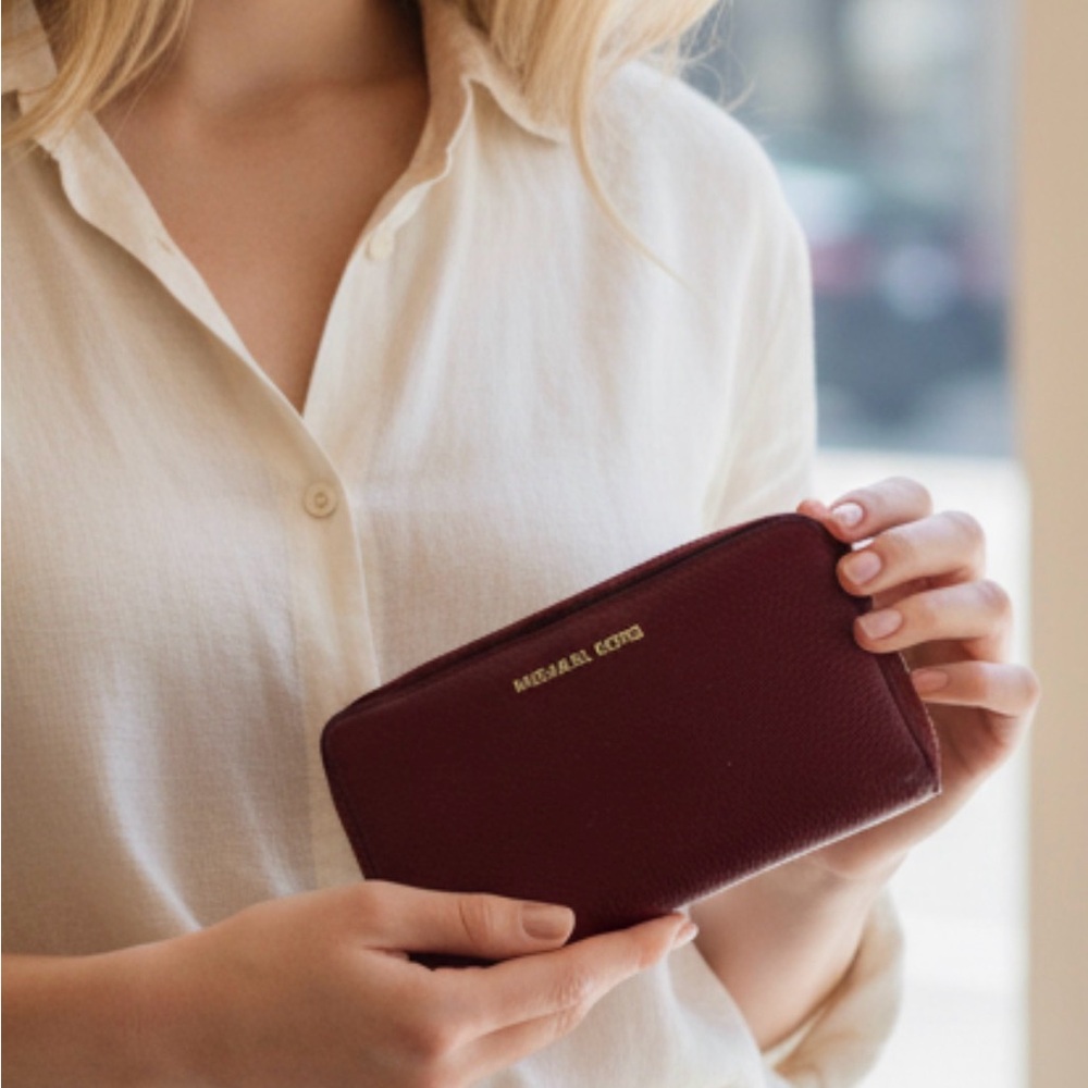 Michael Kors Maroon Zip-Around Leather Wallet with Gold Logo